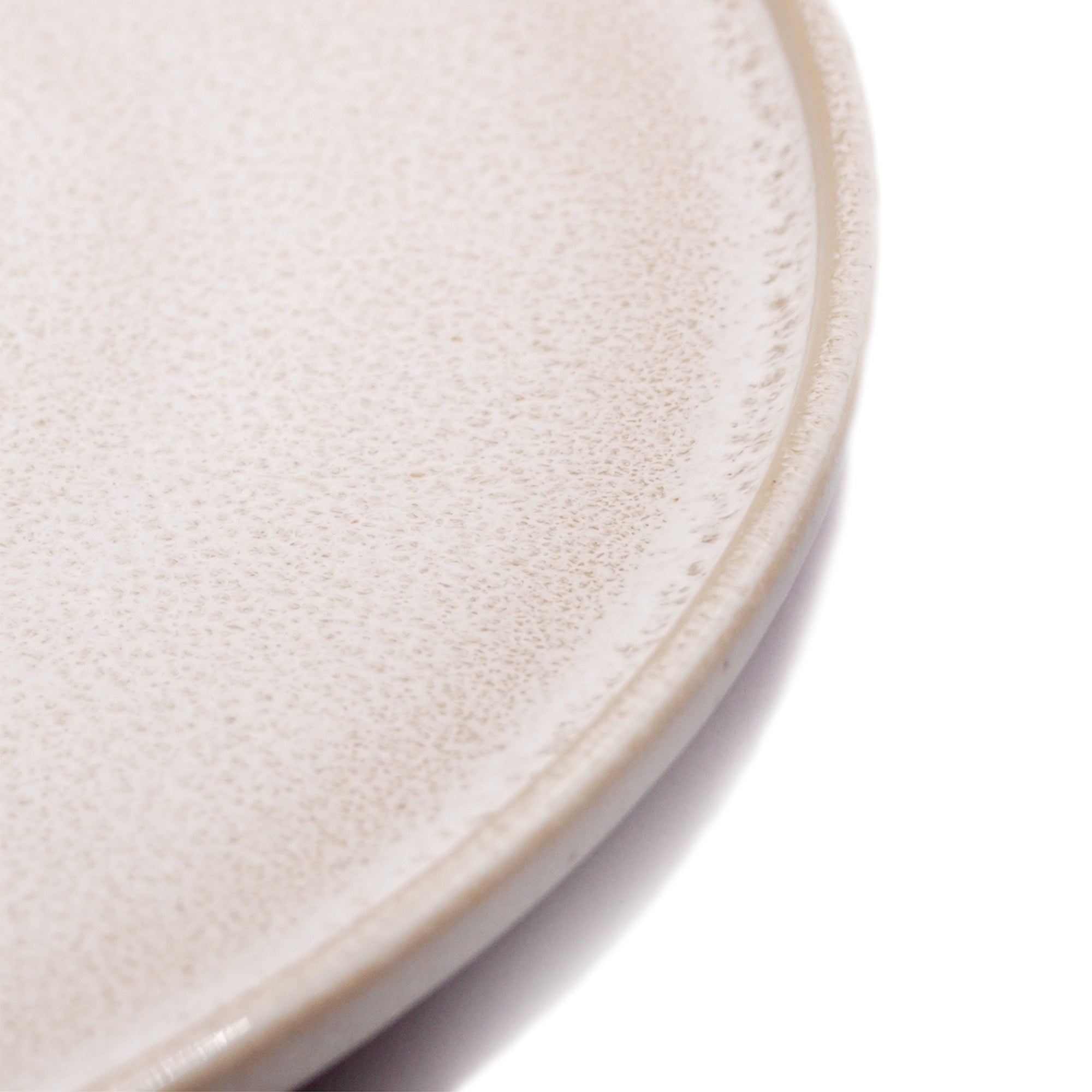 Innenseite von Steingut Teller in Beige.